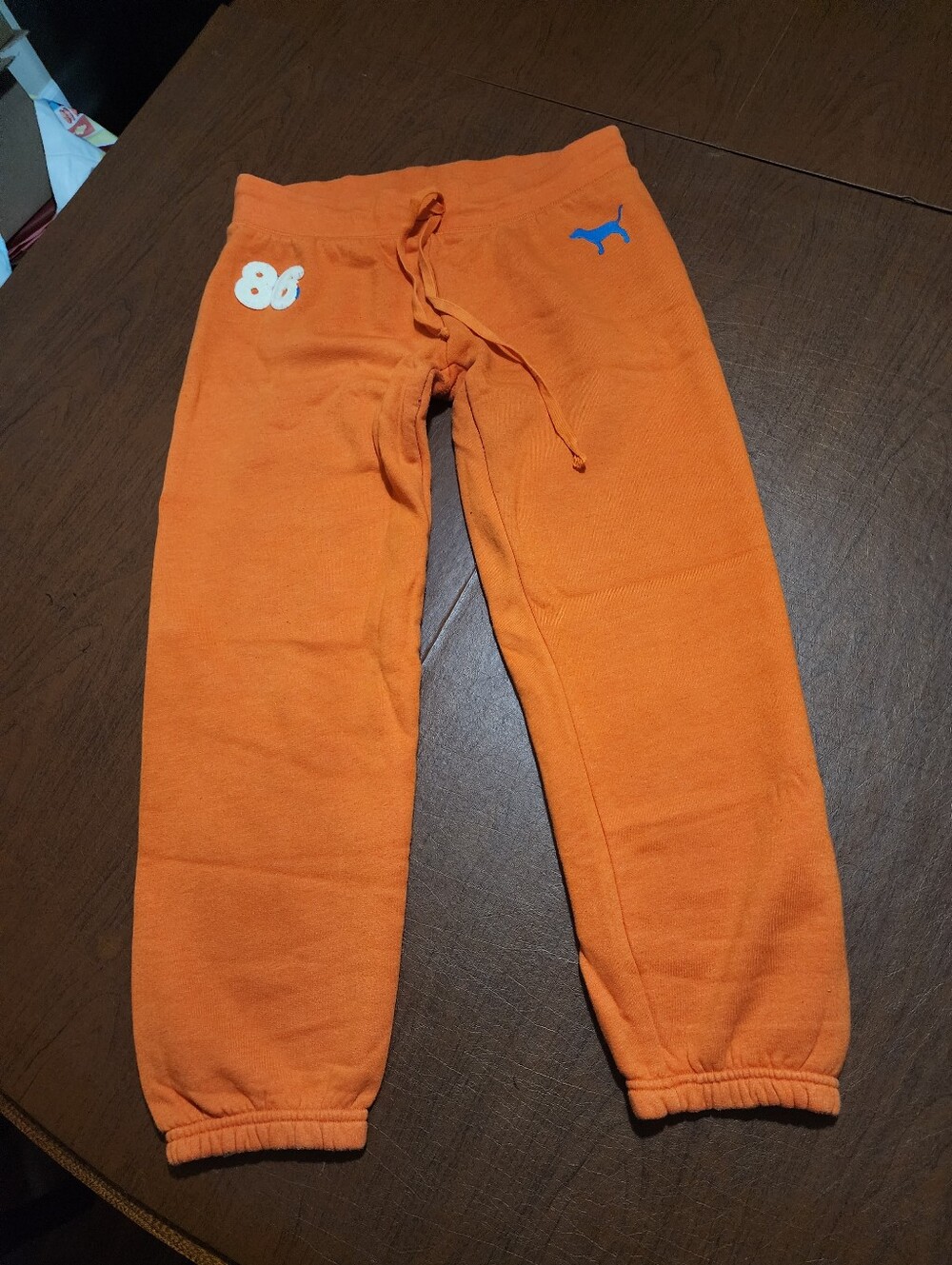 PINK Victoria's Secret Orange Sweat Joggers with Blue Logo